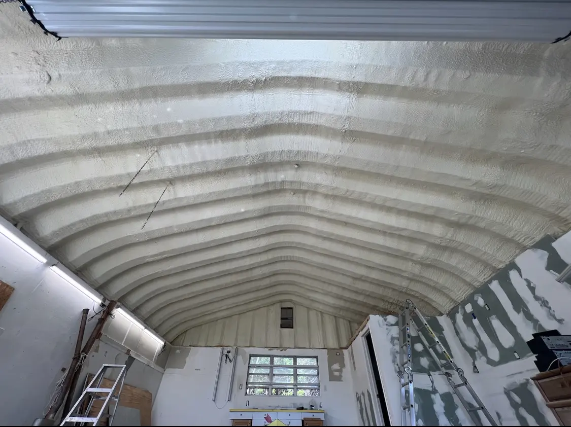 Spray polyurethane foam applied to the underside of a metal roof deck in Granite Bay